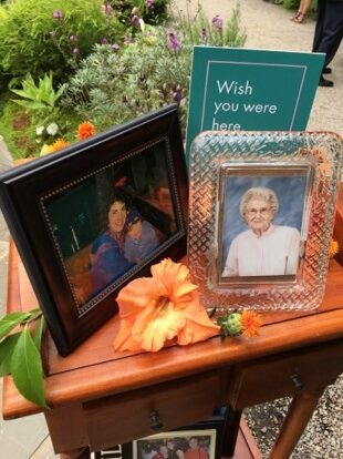 image of a grandmother who passed away and a sign wish you were here